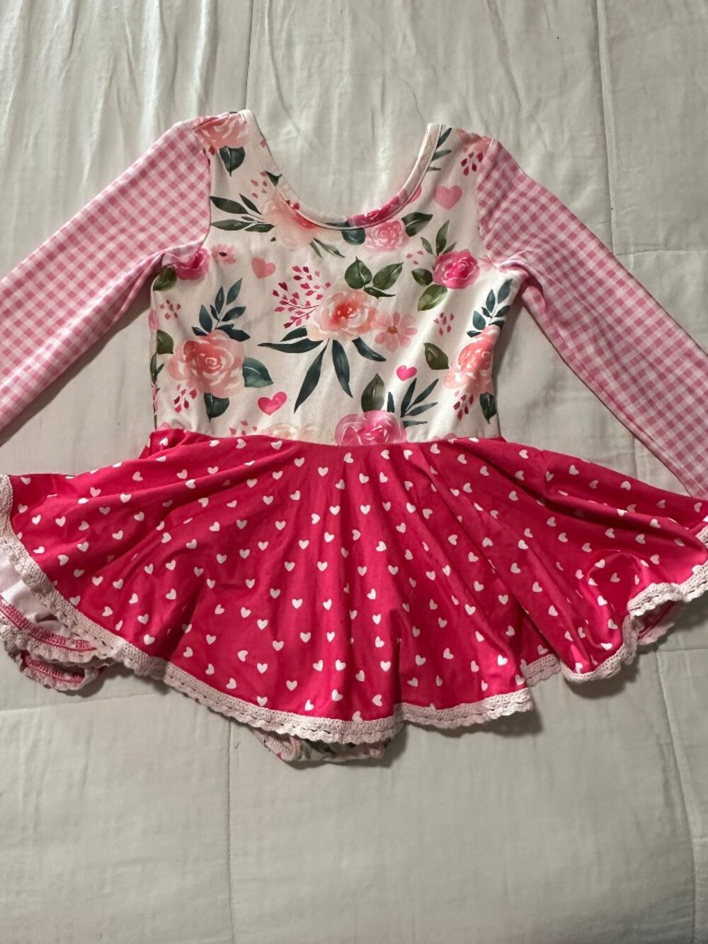 Cheeky Plum Farrah Leotard with a pink floral print and red hearts